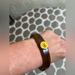 Tortoise Brown Bracelet with Gold Spiral detail
Classic minimalist accessory Photo 1