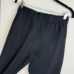 Lululemon  On the Fly Crop Pants Sz 4 Womens Black Travel Woven Mid Rise Photo 13