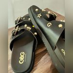 Guess GBG Los Angeles Sandals. Black w/ Gold & Silver Hardware.
NWOT. Size 9 Photo 4