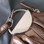 FINAL MARKDOWN LADIES' LuLu Metallic Wristlet Photo 1
