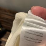 We Wore What  One Shoulder Cutout Jersey Tank in Cream Size Small Photo 6