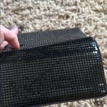 Sleek Black Textured Clutch with Wristlet Photo 4