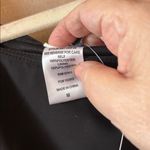 Wrapper  Black cold shoulder Top with Silver Accents medium nwt Photo 4