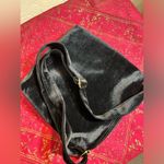 Crossbody NWOT, faux velvet black bag,
Adjust. strap, zip top, side zip pocket Photo 6