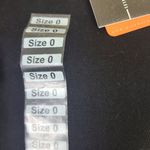 Risen Women's High Rise Crossover Jeans Black Size 0/24 Waist Size 24 Photo 1