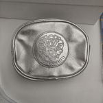 Vince Camuto NWOT  Cosmetic Bag Silver Metallic Faux Leather Zipper Purple Lining Photo 3