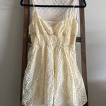 Urban Outfitters pale yellow floral daisy print smock detailed mini dress Photo 0