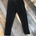 Lululemon  charcoal gray mesh side crop leggings women’s size 2‎ workout pants Photo 1