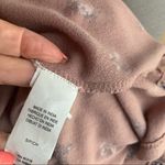 Lucky Brand blush pink floral shark bite hem flutter sleeve top Photo 10