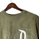 Disney  Women’s Tie Dye Green/White Spirit Jersey- Size Large Photo 1