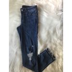 Uniqlo *HPx2!* distressed skinny jeans Photo 1