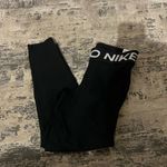 Nike  Black Mid Rise Crop Mesh Panel Leggings Size XS Photo 1
