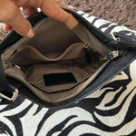 Tumi nylon crossbody bag in black I think it’s the voyager Photo 9