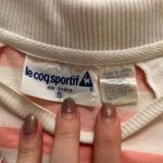 Vintage pink white uneven striped polo shirt Made in Japan Size small Photo 1