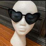 Black Heart Eyes Sunnies Black Sunglasses. gently warn and excellent condition. None smoking home. Priced to sell at as is condition or make reasonable offers. Photo 0