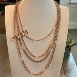 Elegant Gold Layered Necklace with Floral Accents Photo 0