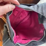 Baggallini grey crossbody bag. Many pockets Photo 6