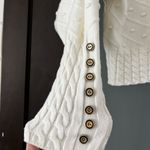 Elegant White Sweater with Button Detail Photo 1
