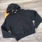 We Wore What Revolve ‎ black hoodie sweatshirt Photo 1