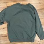 American Eagle Forest Green “Jegging Fit” Lightweight Crewneck W/ Side Slits Photo 3