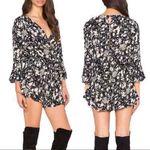 Free People All the Right Ruffles Romper in Raven Combo Button Back 3/4 … Photo 1