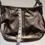 Relic BRAND SILVER METALLIC SHOULDER BAG POCKETS IN FRONT ZIPPER CLOSURE ON TOP Photo 14