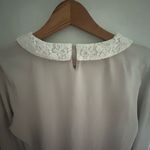 Garnet Hill  size medium jersey knit lace collar long sleeve top. Photo 1