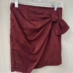 Storia  Mini Skirt Suede Faux Wrap Bow Mini Skirt Burgundy Size Small Photo 0