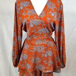 Boutique Adorable long sleeve orange and purple abstract print romper dress size medium Photo 1