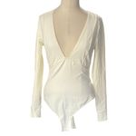 Free People  Intimidately Cream V-Neck Bodysuit Size XS Photo 1