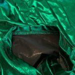 Boutique NWOT Metallic shiny short sleeve top size M Photo 9