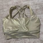 Buffbunny Collection  metallic gold sports bra size small Photo 2