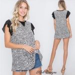 HEIMISH USA Black and White Animal Print Blouse Size M Photo 2