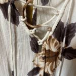 O'Neill  size S jumpsuit  (shorts) crepe floral lace up front key hole back. Photo 3