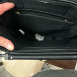 Michael Kors .
Crossbody Bag Preowned with wear! Photo 4