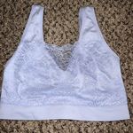 Rhonda Shear light blue sports bra with lace overlay‎ size large Photo 0