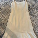 BCBGeneration White Sleeveless Dress with Ruffle Hem Photo 1