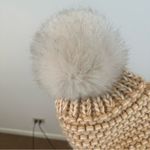 Free People  | Tan Knit Winter Hat with Large Pom Pom Photo 1