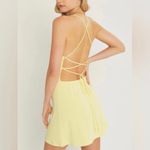 The Copper Closet NWT Yellow Boutique Tie Back Mini Dress Photo 1