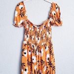 Olivaceous  Orange Floral Off Shoulder Smocked Romper Photo 0
