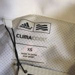 Adidas White Blouse with Orange Floral Design Photo 1