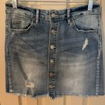 Indigo Rein  medium/light was distressed button front denim mini skirt. Photo 2