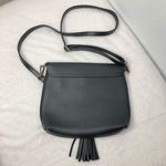 Black Crossbody Purse with Silver Ring and Tassel Photo 3