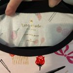 Kate Spade  Dream a Little Dream sleepshirt in pink with makeup & bows. Photo 4