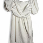 Size medium flowy white dress with runching in the back and puffy sleeves Photo 0