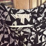 Lila Rose Black and White Sleeveless Top Photo 1