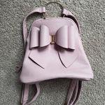 Chic Pink Bow Backpack with Structured Design Photo 0