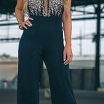 L'ATISTE Black Netting Haltered Jumpsuit Photo 0