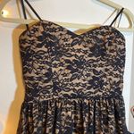 B. Wear Black Lace Mini Dress Photo 4