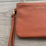 Adrienne Vittadini Studio Charging Wallet Wristlet in Peachy Pink Color Photo 1